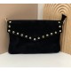 Bolso clutch Tachuelas